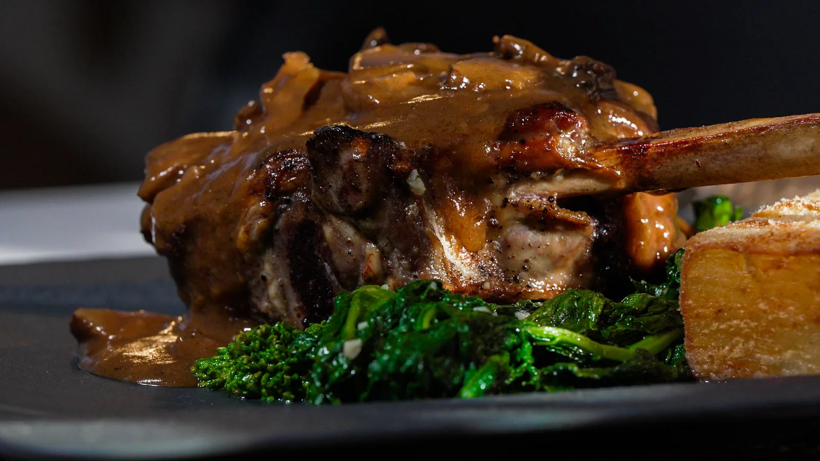 Braised shank with potatoes and greens