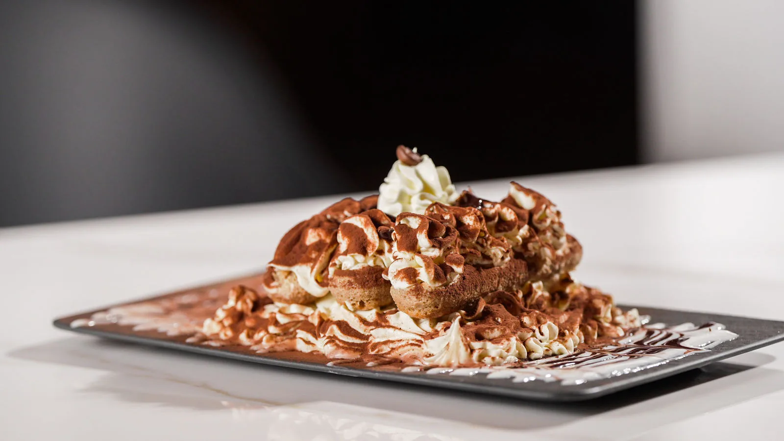 Tiramisu on a marble table